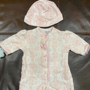 Newborn onesie with matching hat. Wore once!